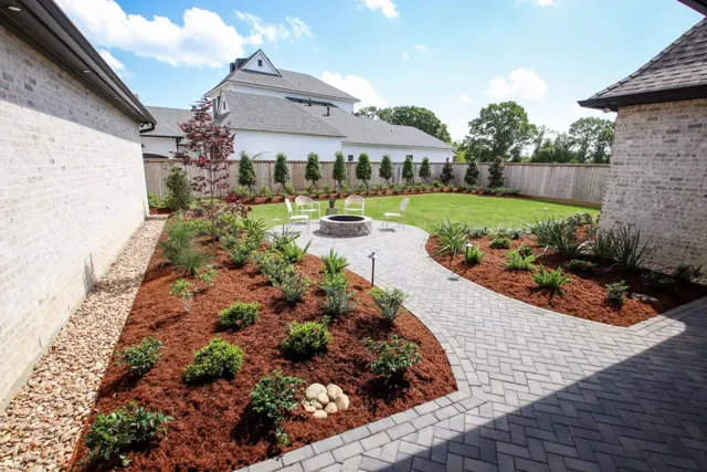 Anderson project — Paver patios · Fire pit · Planting · Lighting