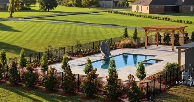 Reed project — Timber pergola · Fire pit · Sugar kettle fountain