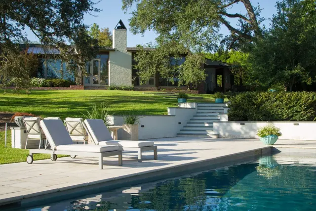 Riverfront Residence project — Dry creek · Stone terraces · Fire pit · Maintenance